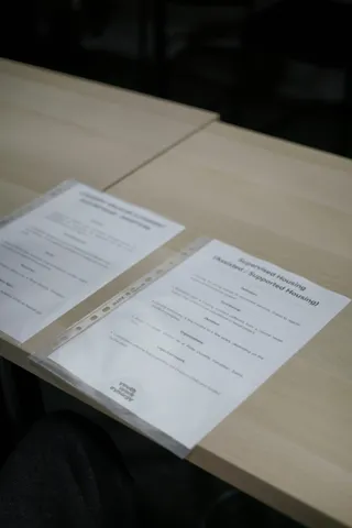 Workshop handouts on a table at Get Your Home